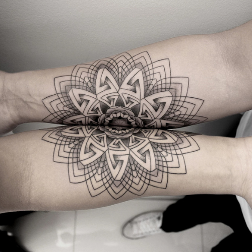 mandala across two arms making one sacred geometry