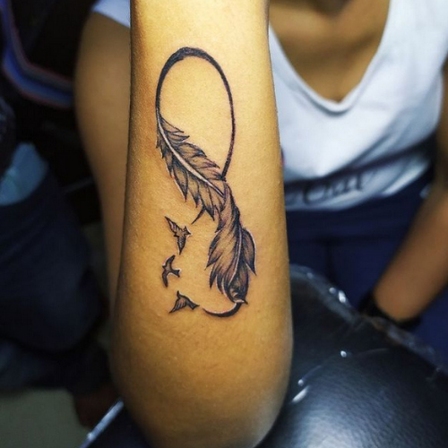 infinity symbol feather with birds