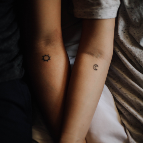 tiny moon and sun twin flame tattoos