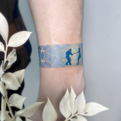 dancing couple blue wristband tattoo