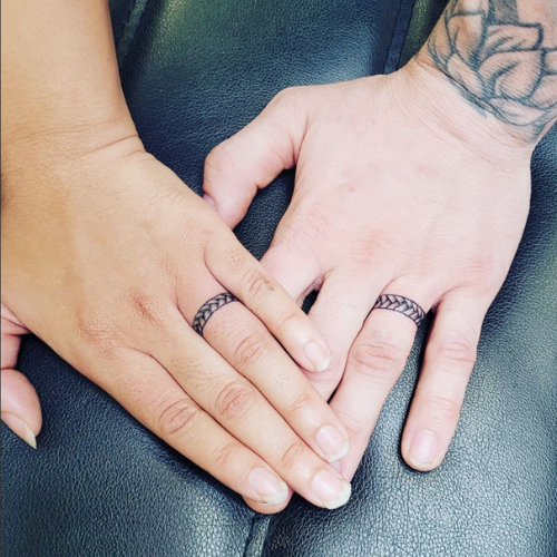 couple tattoos of wedding ring braids