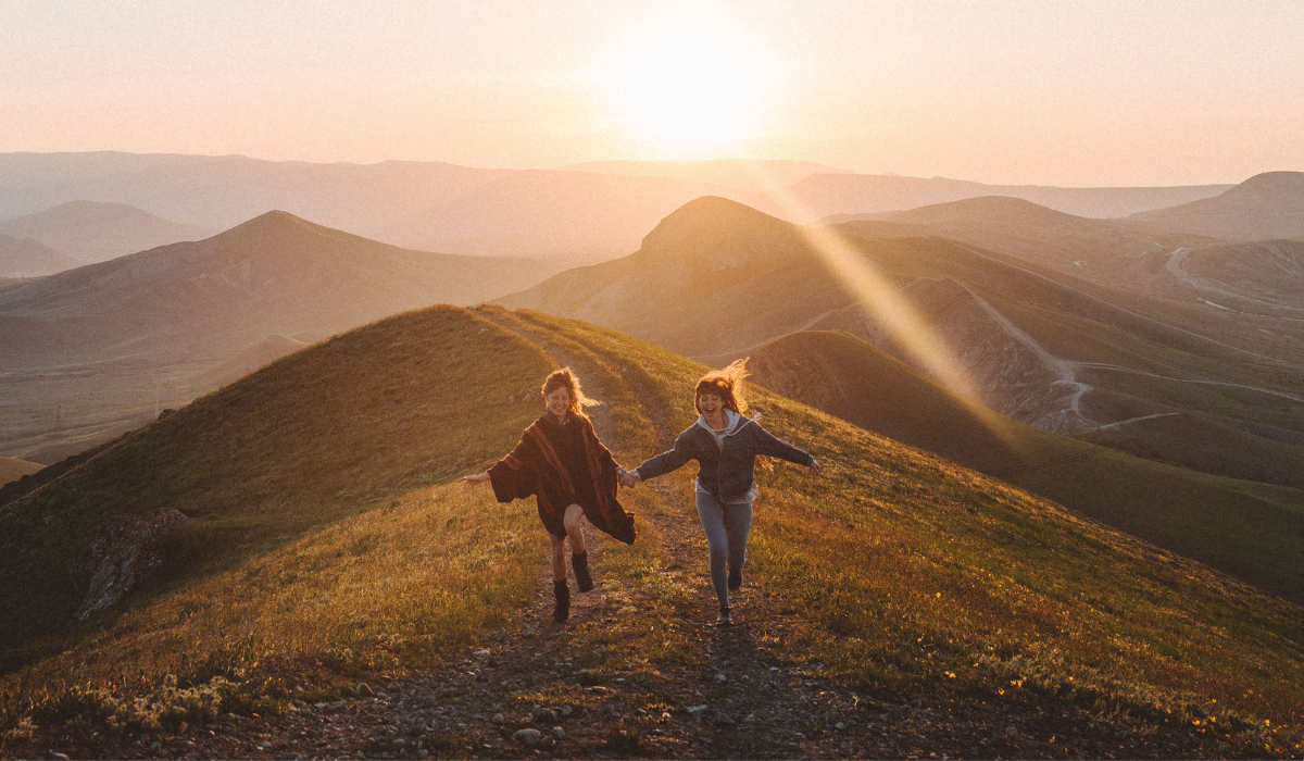 joyful lgbtq twin flames running together