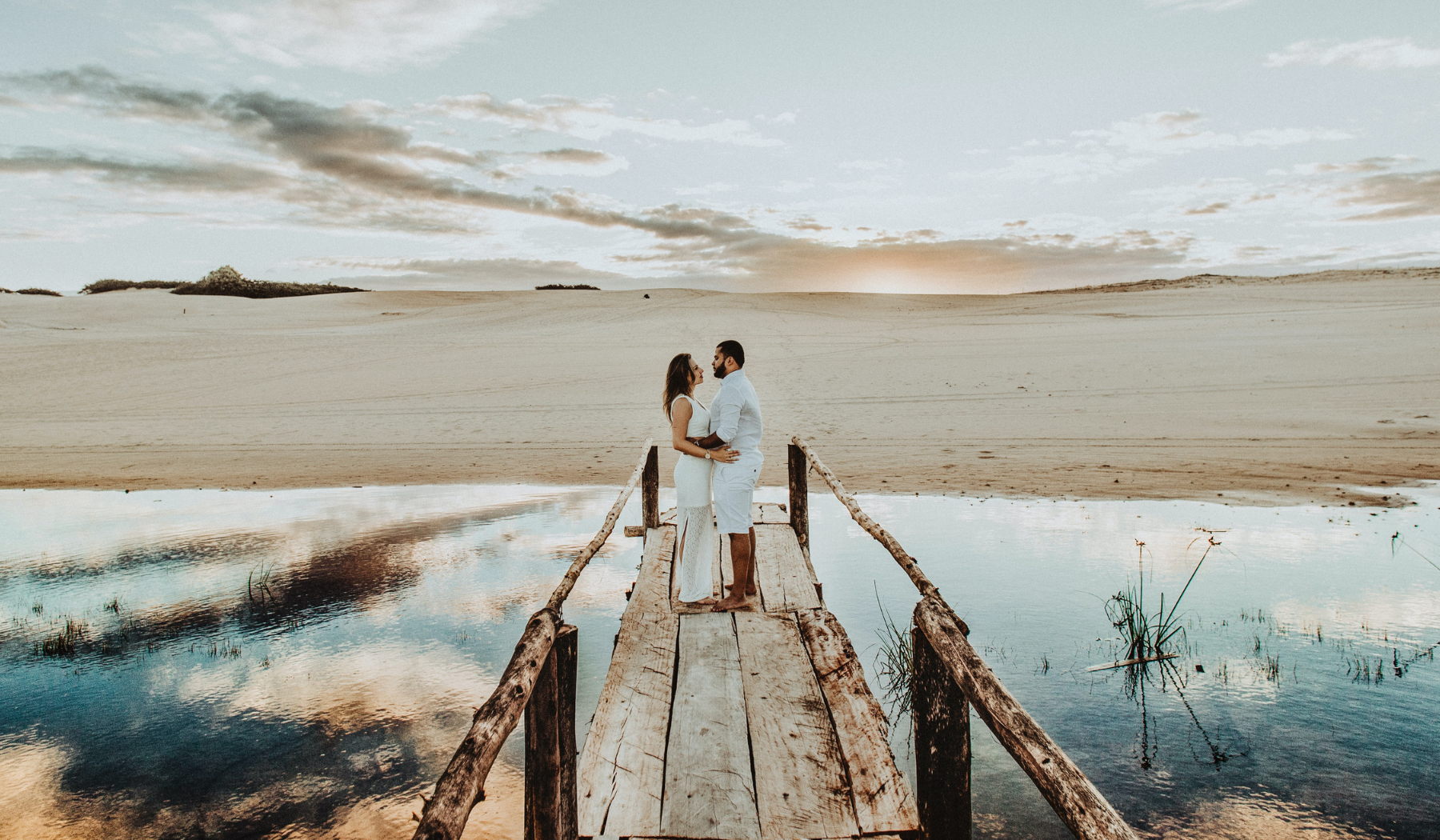 twin flame on a wood bridge on the lake