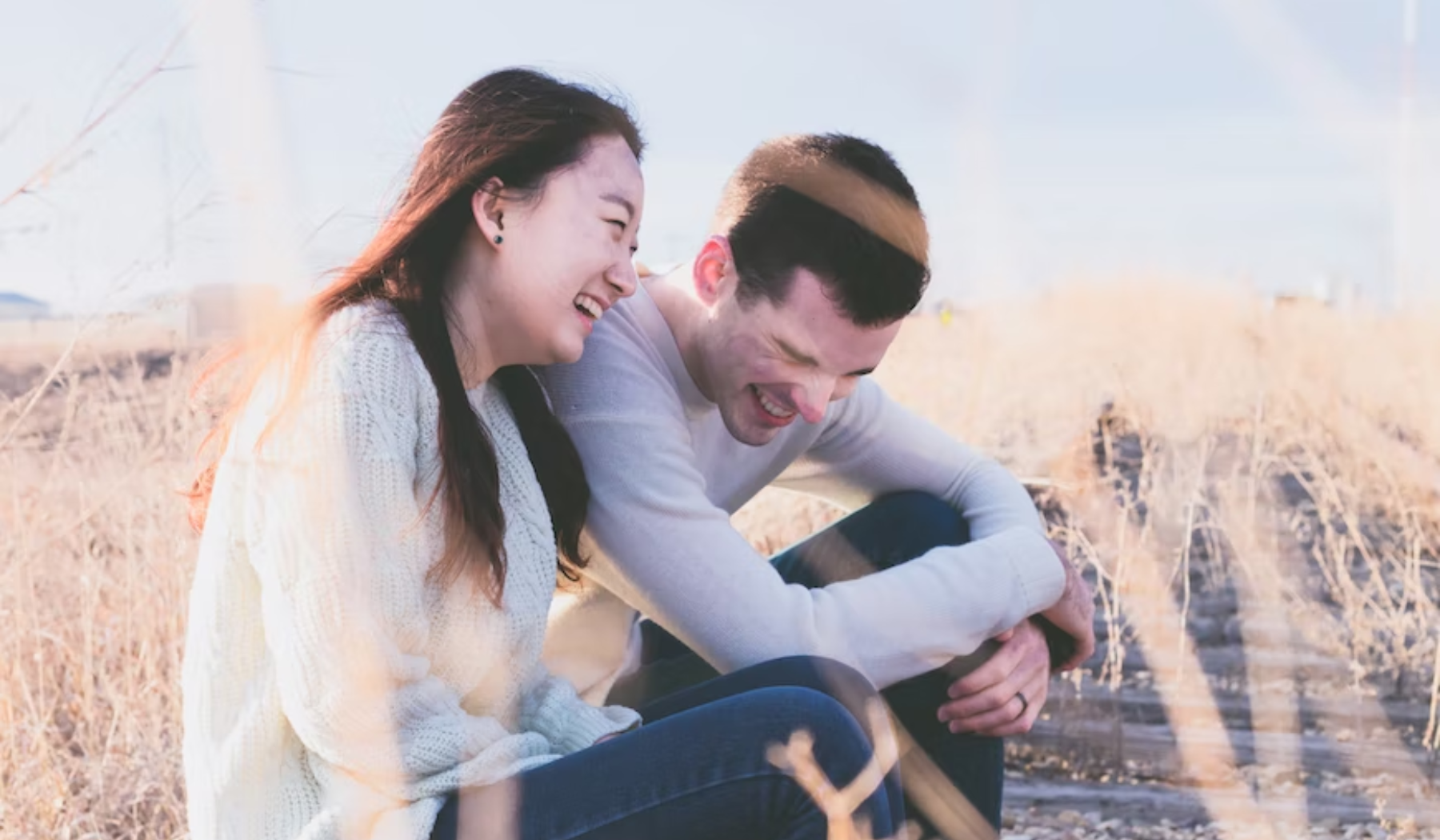 man laughing with his woman